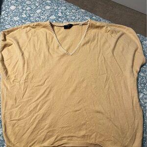 Sweater vest top. Embroidered